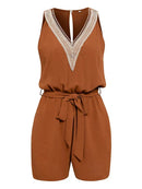 Solene - Alsidig jumpsuit med V-udskæring og blonder