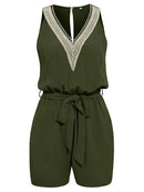 Solene - Alsidig jumpsuit med V-udskæring og blonder