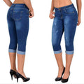 Jadefarvet cropped jeans med støttende design