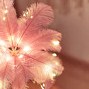 FeatherGlow - Stilfuld strudse-natlampe med rosaguld base