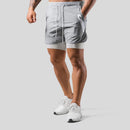 Jaxon – 2 i 1 sportsshorts med lynlåslommer