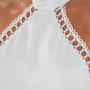 Lena – Halter neck-kjole med åben ryg og udskårne detaljer