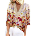 Joyce - Stilfuld bluse med blomsterprint, korte ærmer og