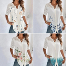 Ava - Bluse med blomsterprint og knaplukning foran