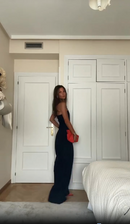 Abigail - Moderigtig stropløs jumpsuit med lommer