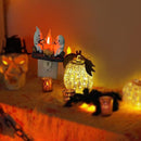 GhostGlow - Flimrende lejrbålslampe med 3D LED-spøgelse