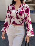 Marika - Elegant bluse med V-hals, lange ærmer og
