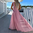 Amelia – Jumpsuit uden ærmer med V hals og talje med bælte