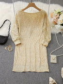 Alana - Glitrende off-shoulder kjole med sequin-detaljer