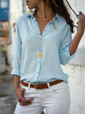 Emily - Elegant bluse med knaplukning og oprullede ærmer