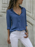 Emily - Elegant bluse med knaplukning og oprullede ærmer