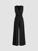 Ava - Elegant Armeløs Jumpsuit Med Dyb V-Hals