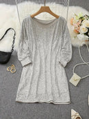 Alana - Glitrende off-shoulder kjole med sequin-detaljer