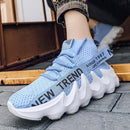 Milan minimalistiske low-cut sneakers med åndbar overdel og