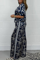 Thalia - Dame printet jumpsuit med V-hals og lynlås foran