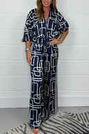 Thalia - Dame printet jumpsuit med V-hals og lynlås foran