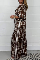 Thalia - Dame printet jumpsuit med V-hals og lynlås foran
