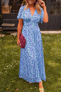 Ruth - Stilfuld plisseret V-hals kjole med blomsterprint