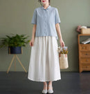 Ella – Moderne bluse med korte ærmer & knappet front