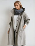 Solenne - Trenchcoat med hætte og afslappet oversized pasform