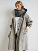 Solenne - Trenchcoat med hætte og afslappet oversized pasform