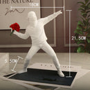 BloomThrower - Moderne blomsterkasterstatue til
