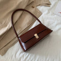 Cressida - Vintage skuldertaske med gyldne detaljer