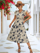 Renata - Feminin A-formet kjole med blødt blomsterprint og