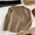 Chic kort vest med knaplukning