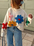Blomsterstrikket sweater i blødt stof