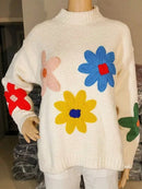 Blomsterstrikket sweater i blødt stof