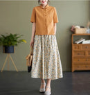 Ella – Moderne bluse med korte ærmer & knappet front