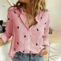 Skylar - Knap-op bluse med fugleprint og afslappet pasform