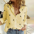 Skylar - Knap-op bluse med fugleprint og afslappet pasform