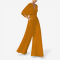 Daisy – Løs kortærmet jumpsuit med V-hals