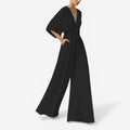 Daisy – Løs kortærmet jumpsuit med V-hals