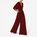 Daisy – Løs kortærmet jumpsuit med V-hals
