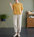 Ella – Moderne bluse med korte ærmer & knappet front